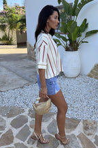 Camisa oversize de rayas con manga corta