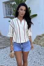 Camisa oversize de rayas con manga corta