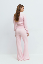 Conjunto de punto con top corto y pantalón de tiro alto