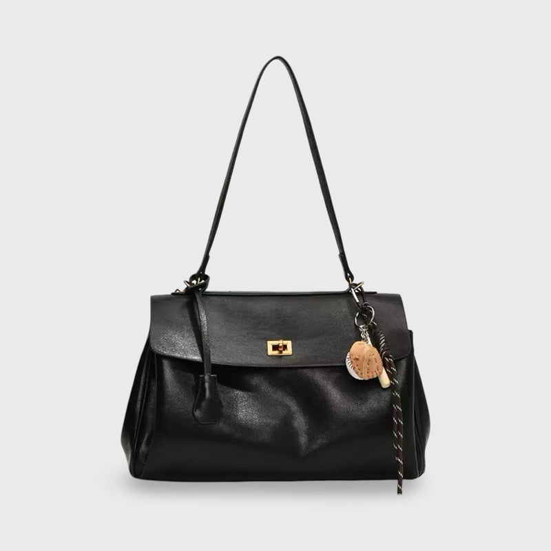 Bolso con cierre giratorio y colgante