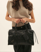 Bolso de piel grande con asa larga