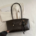 Bolso estructurado con asas largas