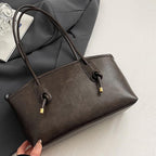 Bolso estructurado con asas largas