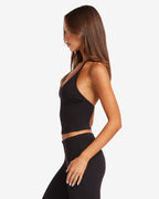 Conjunto de top halter con sujetador integrado y leggings de campana