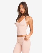 Conjunto de top halter con sujetador integrado y leggings de campana