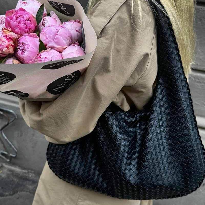 Bolso de hombro oversize trenzado