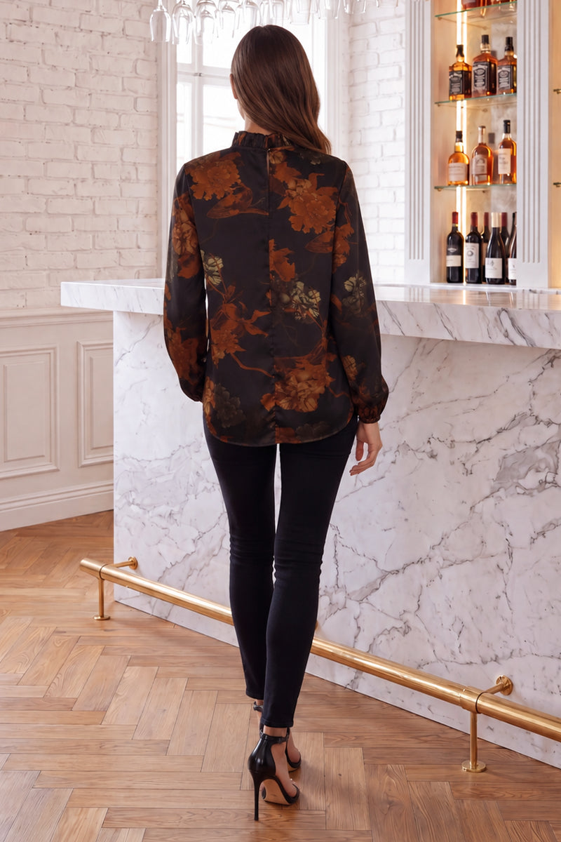 Blusa de flores con cuello de volante