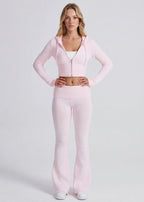 Conjunto de punto con chaqueta y pantalón acampanado