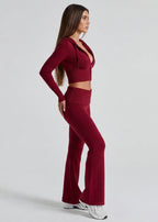 Conjunto de punto con chaqueta y pantalón acampanado