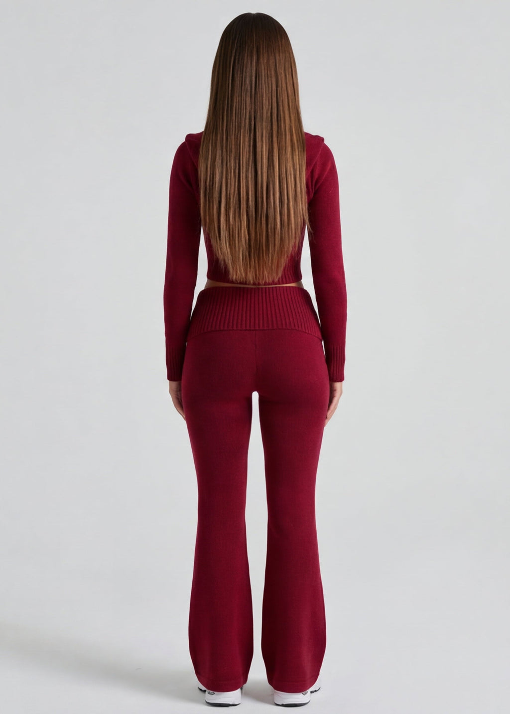 Conjunto de punto con chaqueta y pantalón acampanado
