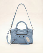 Bolso de piel pequeño con asa larga